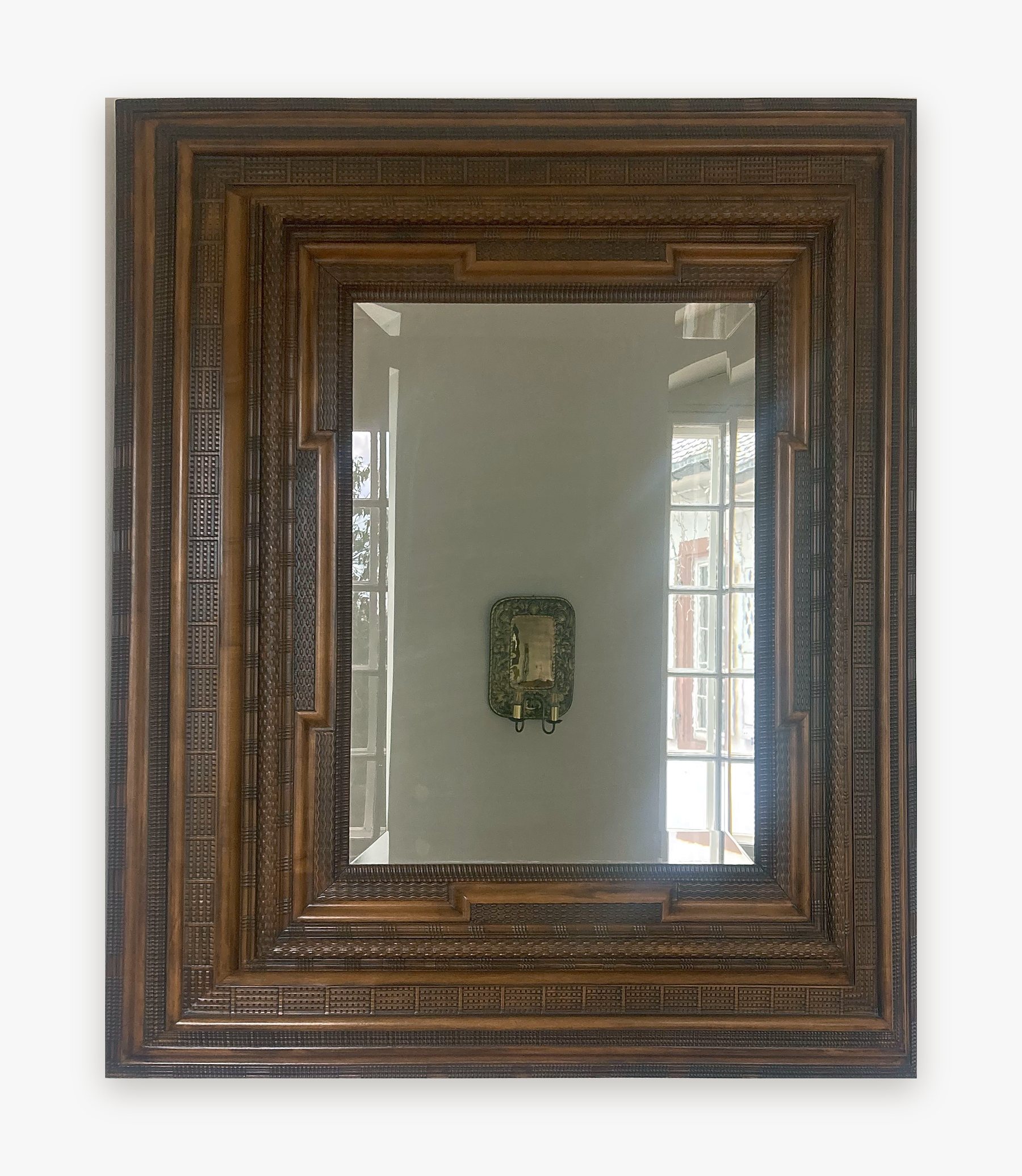 Cadre de miroir à moulures ondées et tressées